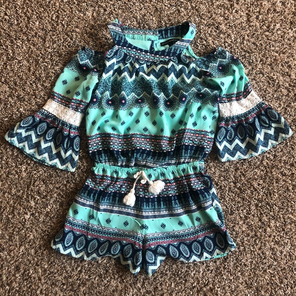Ruffled cold shoulder romper